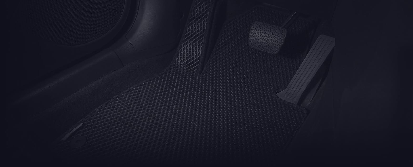 Close-up of EVA rhomb mat installed in a clean interior